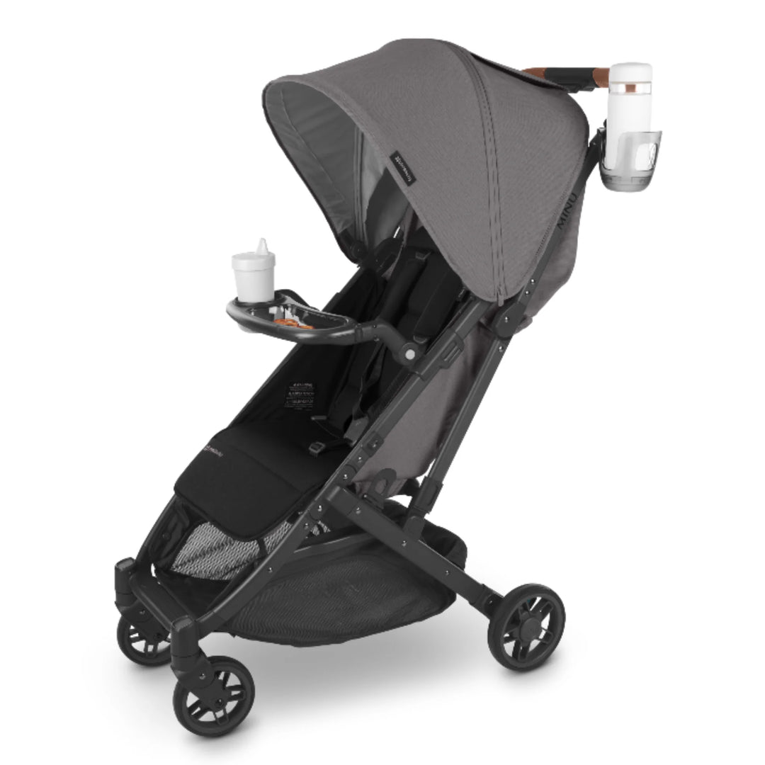 UPPAbaby Minu V2 travel stroller in Greyson with snack tray and cup holder accessories, shown on a white background.