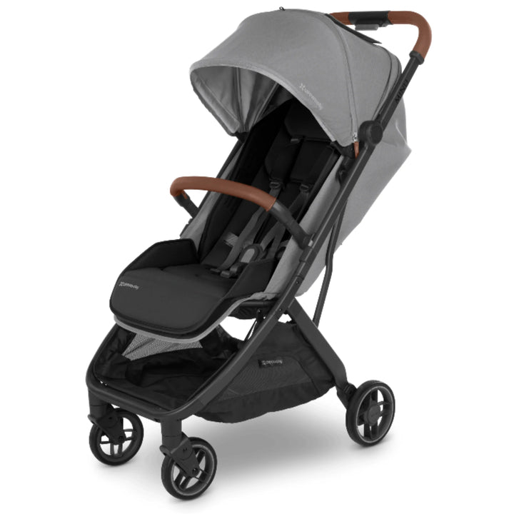“UPPAbaby MINU V3 stroller, angled view, with Saddle (brown) bumper bar and grey canopy, on a white background.”