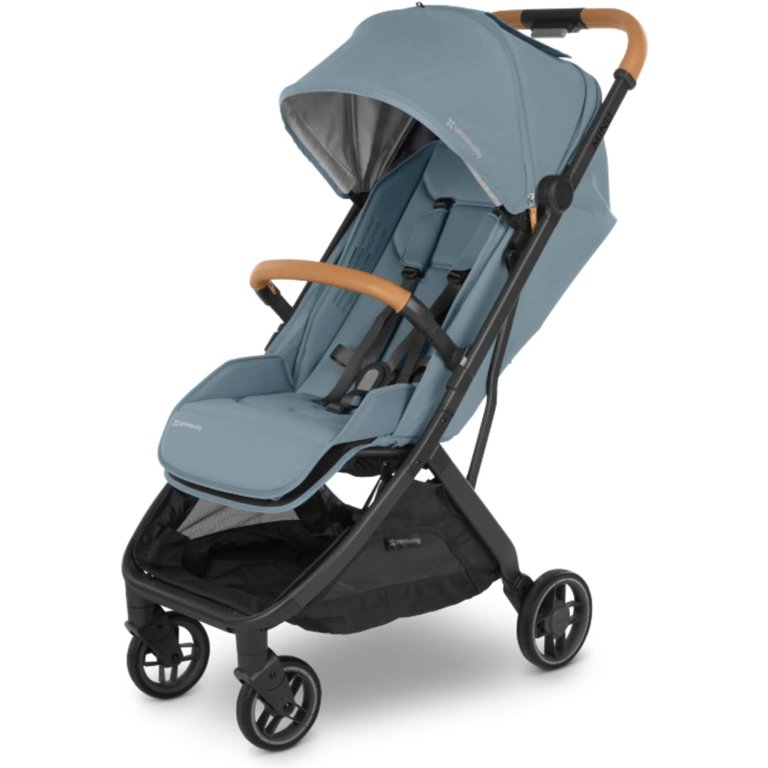 UPPAbaby MINU V3 stroller in light blue with Sand bumper bar and black frame, on a white background.