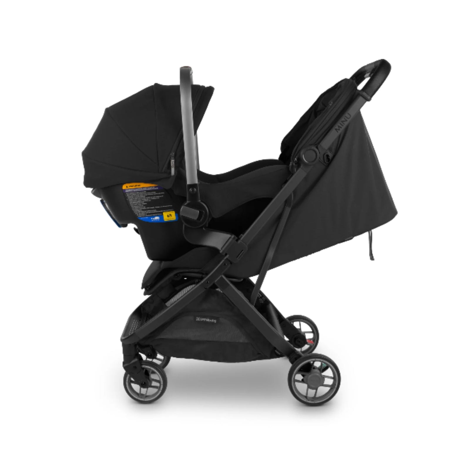 Side view of UPPAbaby Minu V3 stroller with infant car seat attached using angled car seat adapters (Maxi-Cosi, Nuna, Cybex compatible)