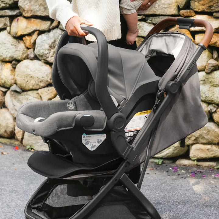 UPPAbaby Minu V3 stroller with Mesa i-Size infant car seat attached using Minu V3 car seat adapters