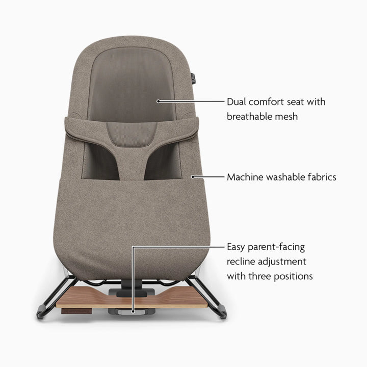 UPPAbaby taupe bouncer feature callout with dual seat and breathable mesh and machine washable fabrics with easy recline adjustments.
