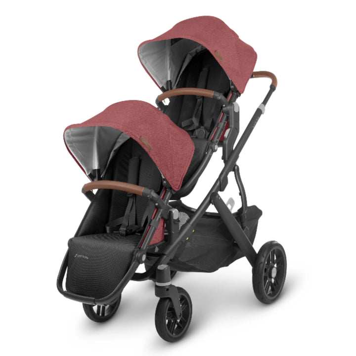 UPPAbaby Vista stroller configured as a double with two seats and Lucy red canopies on a white background.