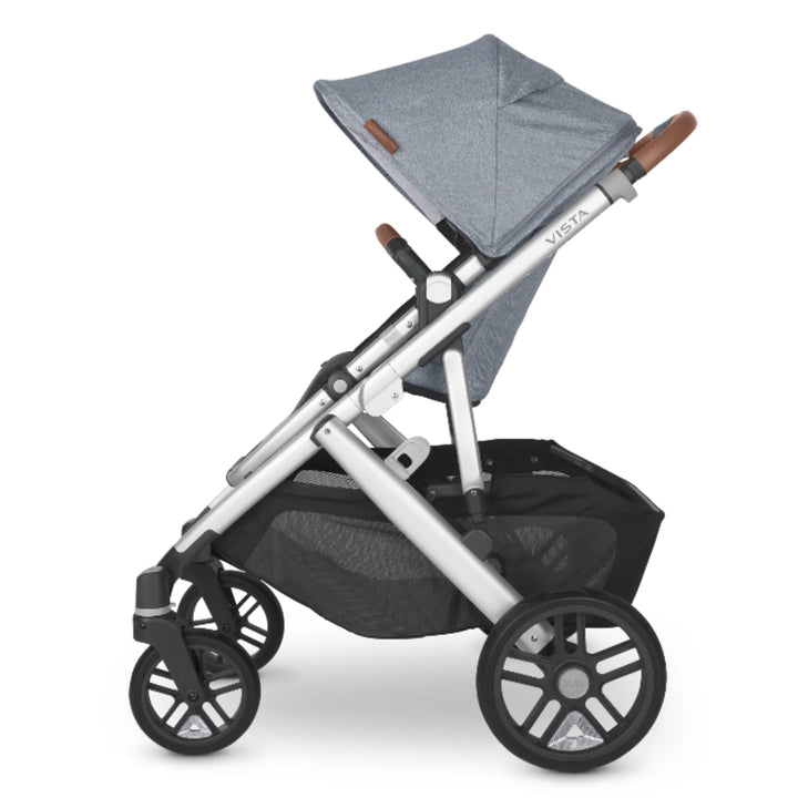 UPPAbaby Vista stroller with snap-on wheel reflectors fitted to rear wheels for added night-time visibility and safety.