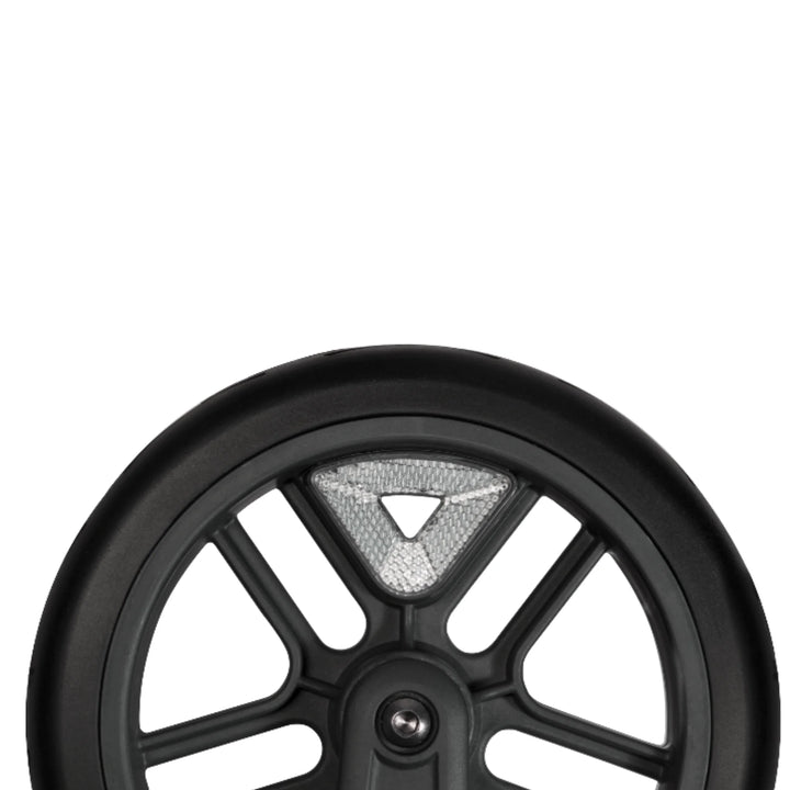 “UPPAbaby Vista snap-on wheel reflector installed on stroller wheel for improved visibility and safety.”