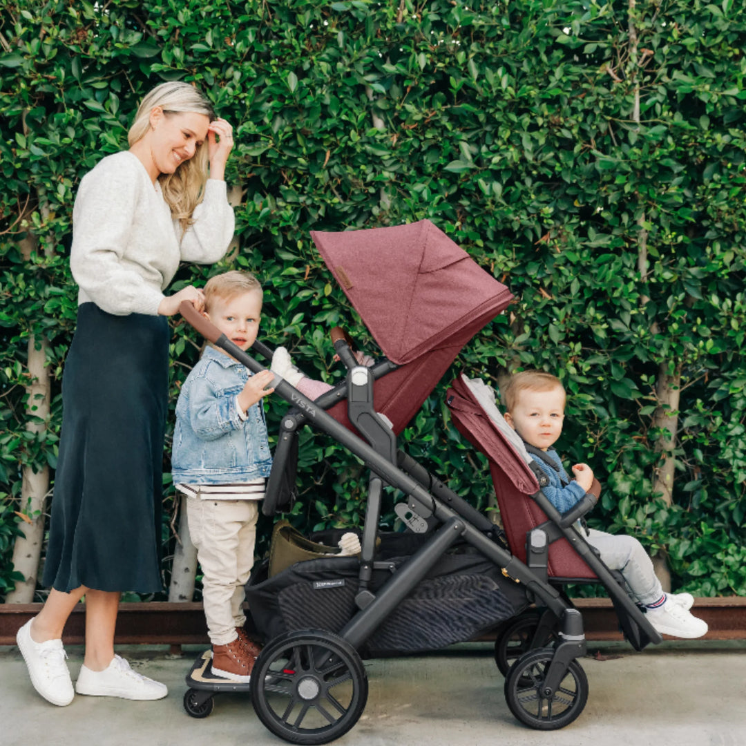 “UPPAbaby Vista V2 stroller with PiggyBack ride-on board, toddler standing platform for older child”