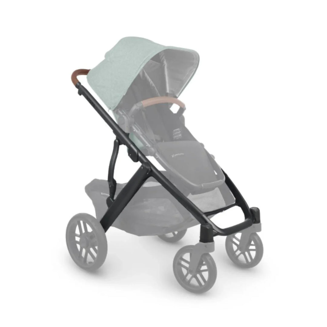 UPPAbaby Vista V2 replacement base frame in carbon with saddle leather handle, shown assembled with stroller seat and wheels, premium modular baby pushchair frame