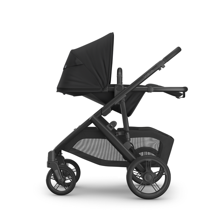 This image shows the Vista V3 in Jake with the toddler seat in the lie flat recline position.