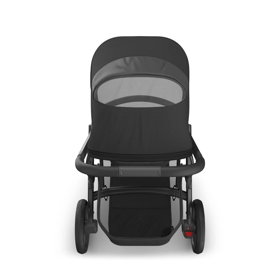 UPPAbaby Vista V3 Jake bassinet in black shown from the front, featuring breathable mesh canopy, sleek modern design, and spacious undercarriage storage basket.