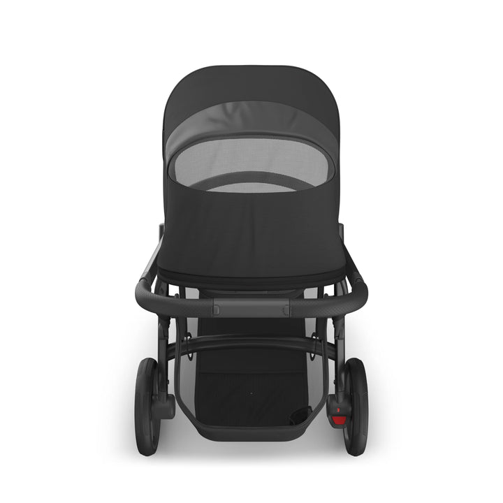 UPPAbaby Vista V3 Jake bassinet in black shown from the front, featuring breathable mesh canopy, sleek modern design, and spacious undercarriage storage basket.