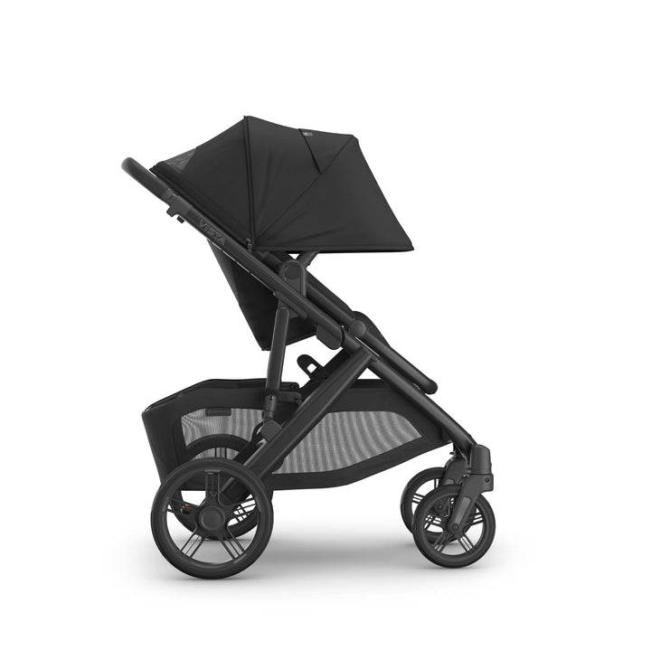 UPPAbaby Vista V3 Jake stroller in black shown in side profile with toddler seat in mid-recline, extended sun canopy, all-terrain wheels, and large under-seat storage basket.