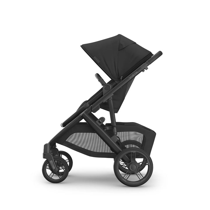 UPPAbaby Vista V3 Jake stroller in black shown in side profile with forward-facing toddler seat, extended sun canopy, adjustable recline, large storage basket, and all-terrain wheels.