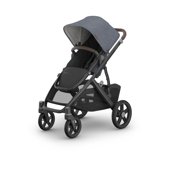 UPPAbaby Vista V3 stroller in Jullian blue shown angled in a studio product shot, highlighting the forward-facing toddler seat, extendable canopy, leather bumper bar, large all-terrain wheels and spacious under-seat storage basket on the premium Vista travel system.