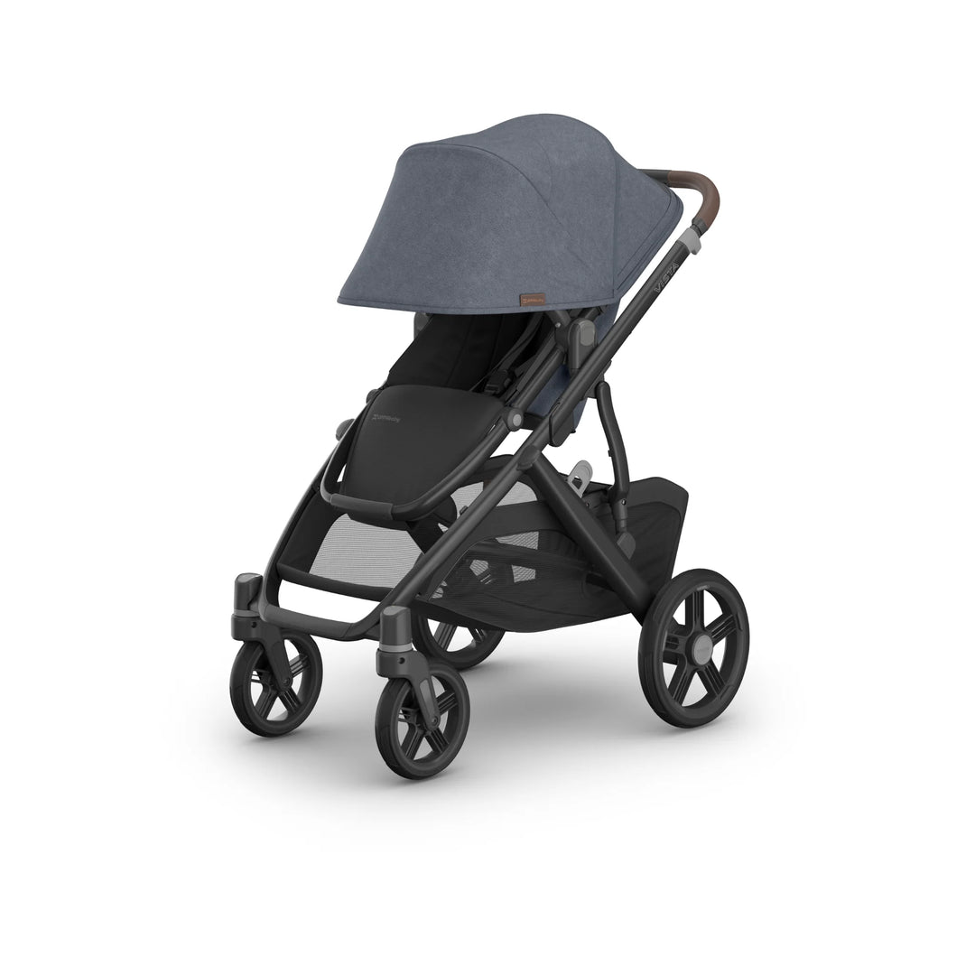 UPPAbaby Vista V3 stroller in Jullian blue shown in a studio product image, featuring the extended canopy, forward-facing toddler seat, durable all-terrain wheels and spacious under-seat storage basket on the premium Vista travel system