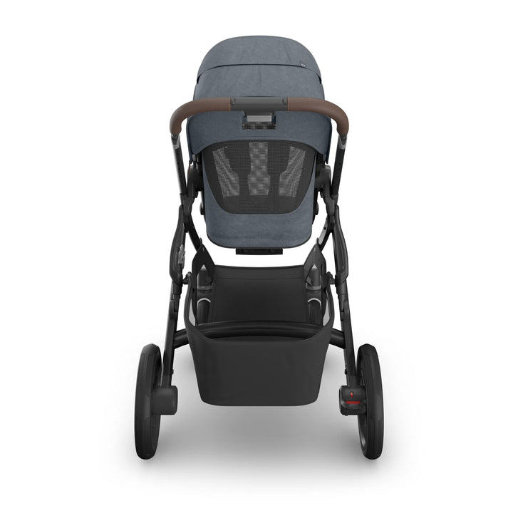 Rear view of the UPPAbaby Vista V3 stroller in Jullian blue, showing the toddler seat with ventilated back panel, leather-accented handlebar, large rear wheels and spacious under-seat storage basket on the premium Vista travel system.