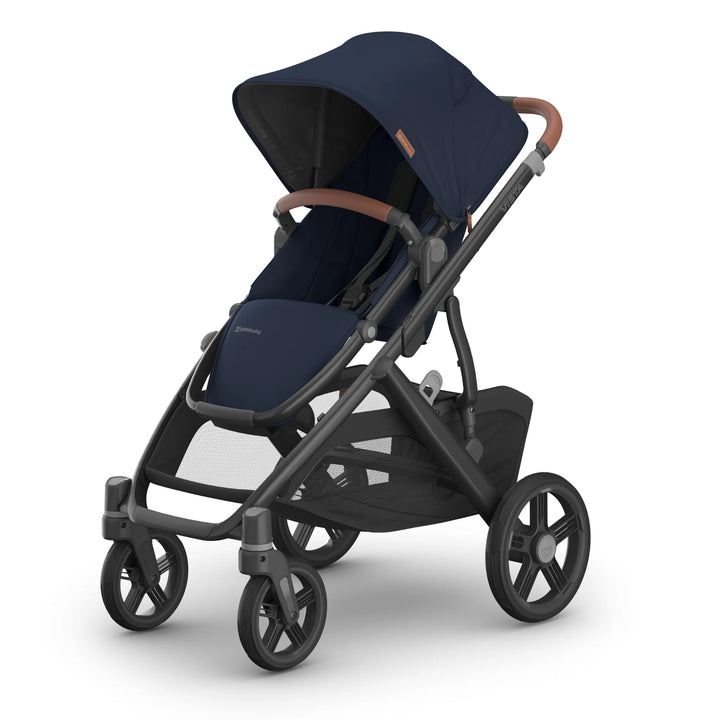 UPPAbaby Vista V3 stroller in the Noa navy blue colourway angled from the front, featuring the extendable canopy, premium leather-accented bumper bar, spacious toddler seat, all-terrain wheels and large under-seat storage basket.