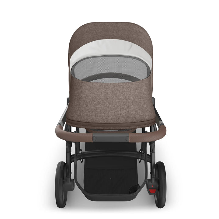 Rear view of the UPPAbaby Vista V3 stroller in Owen, showing the brown textured toddler seat canopy with ventilated mesh panel, leather-accented push handle, large all-terrain wheels and spacious under-seat storage basket on the premium Vista travel system.