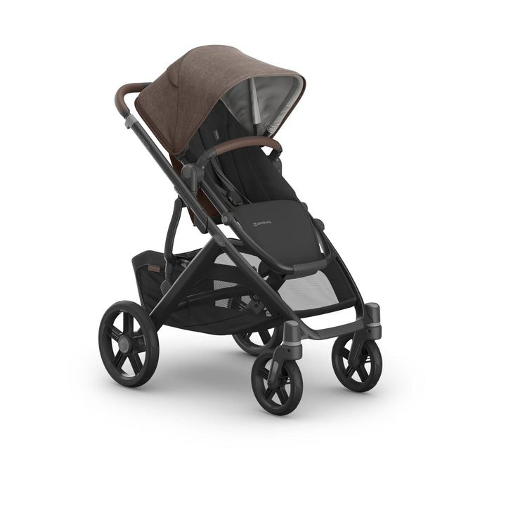 UPPAbaby Vista V3 stroller in Owen, shown angled in a studio image featuring the brown textured canopy, forward-facing toddler seat, leather-accented bumper bar, large all-terrain wheels and spacious under-seat storage on the premium Vista travel system.