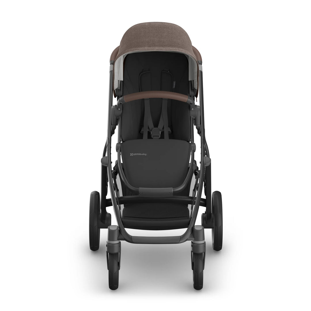 Front-facing view of the UPPAbaby Vista V3 stroller in Owen, showcasing the brown textured canopy, leather bumper bar, padded toddler seat, robust all-terrain wheels and premium Vista travel system design.