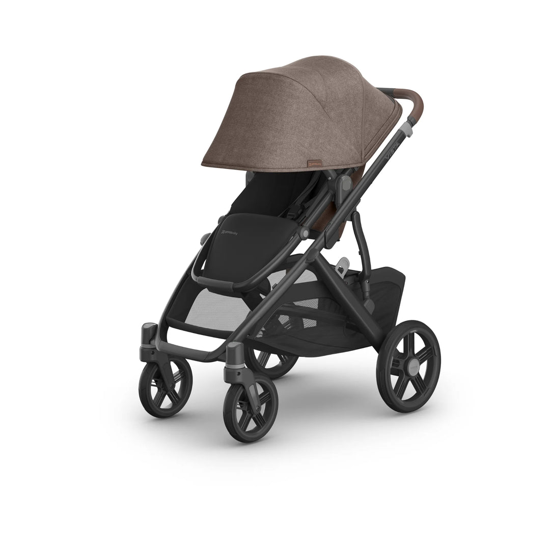 UPPAbaby Vista V3 Owen stroller in forward-facing mode, featuring a brown extended canopy, black toddler seat, leather-accented handlebar, all-terrain wheels, and large under-seat storage basket on a white background.