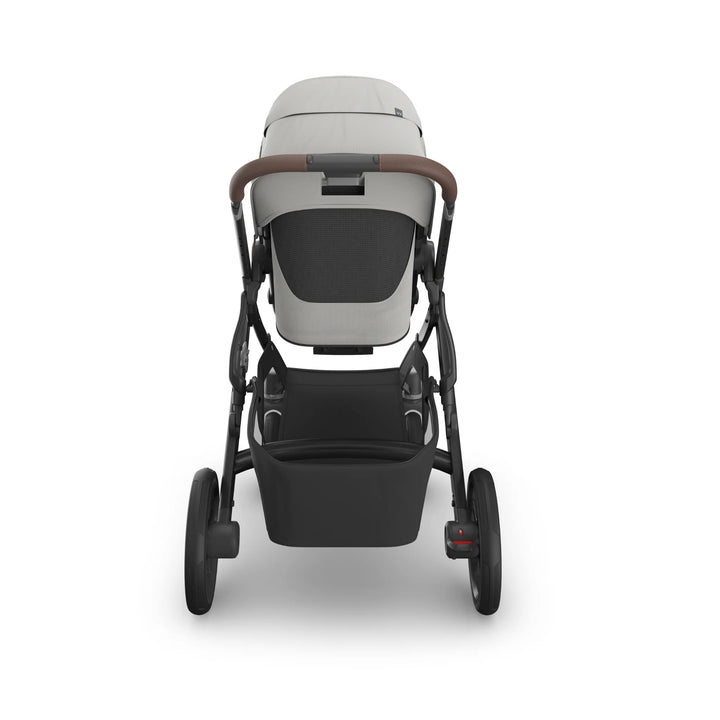 Rear view of UPPAbaby Vista V3 Savannah stroller in light grey, featuring ventilated toddler seat, leather-accented handlebar, large under-seat storage basket, and durable all-terrain wheels.