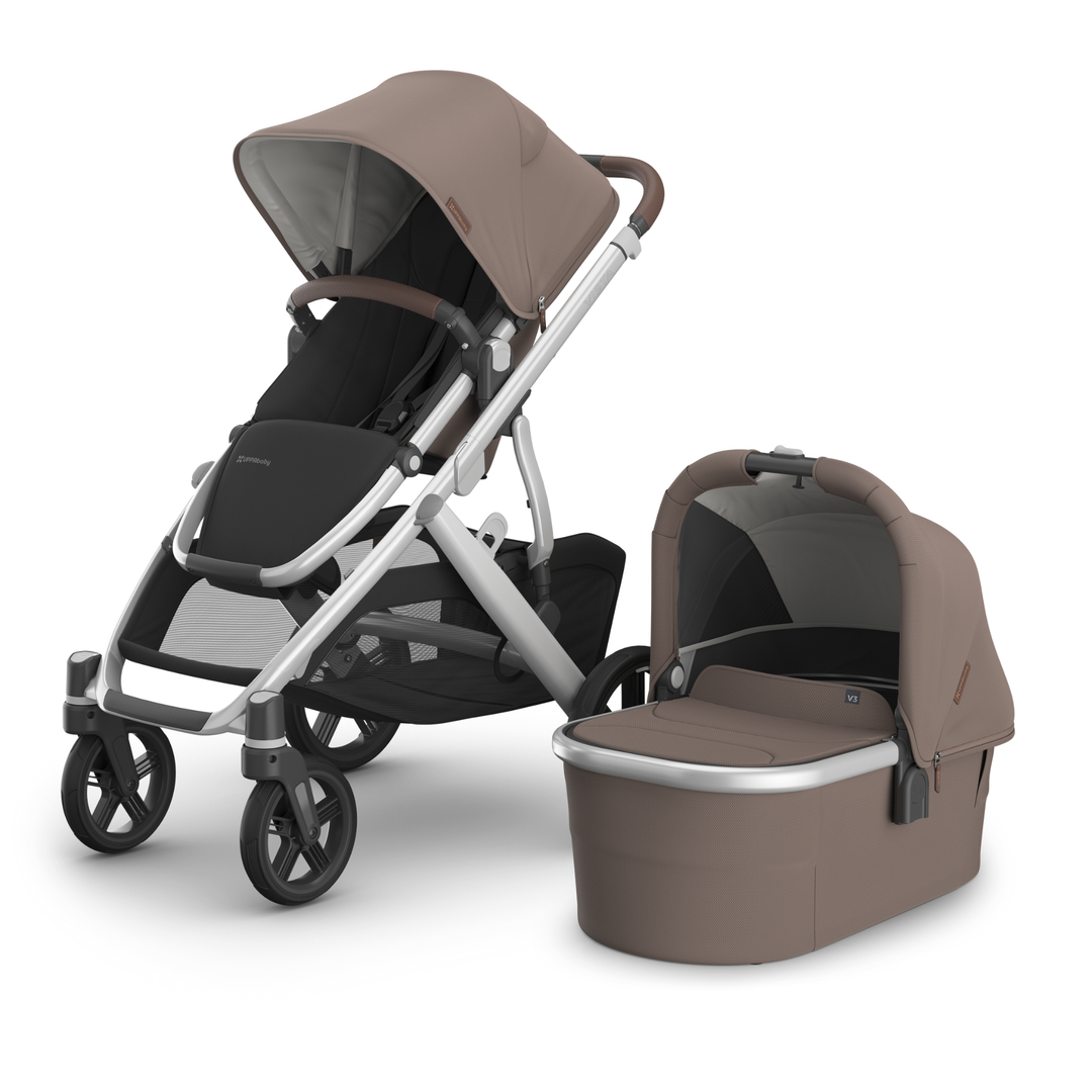 This image shows the Vista V3 in Theo with the Carrycot V3 alongside it.