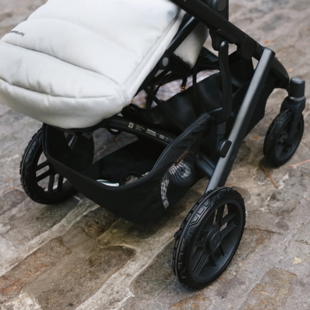 UPPAbaby Vista V2 all-terrain wheel set fitted to stroller, front and rear wheels for smooth outdoor walks”