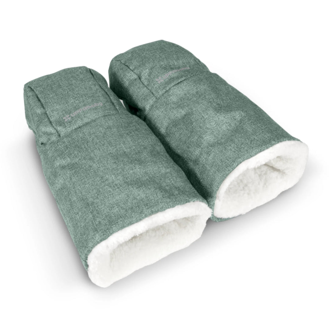 UPPAbaby Cozy Handmuffs in Gwen green, featuring a soft fleece lining and insulated, windproof design to keep parents’ hands warm while pushing a stroller in cold weather.
