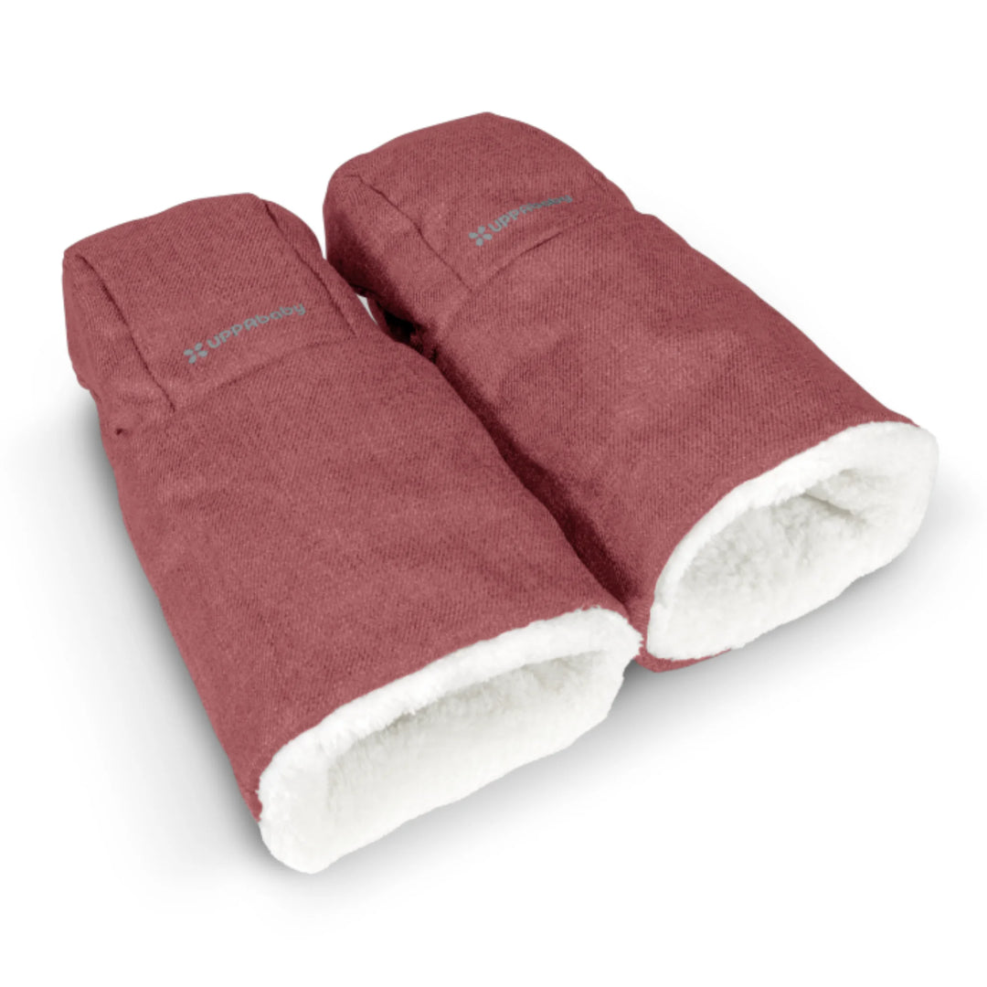 UPPAbaby Cozy Handmuffs in Lucy rose colour, insulated stroller hand warmers with soft fleece lining, designed to keep parents’ hands warm and dry during cold and winter walks.