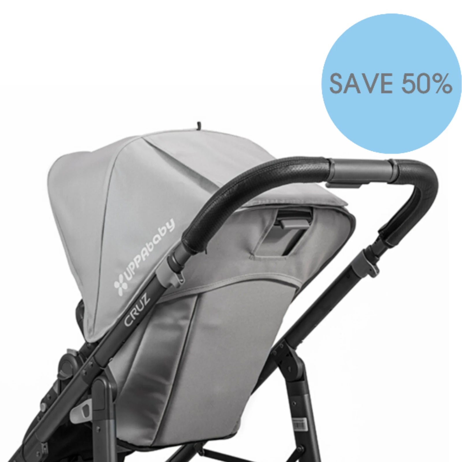 UPPAbaby Cruz black leather handlebar cover fitted on stroller handle, shown on a grey Cruz stroller with ‘Save 50%’ outlet badge.