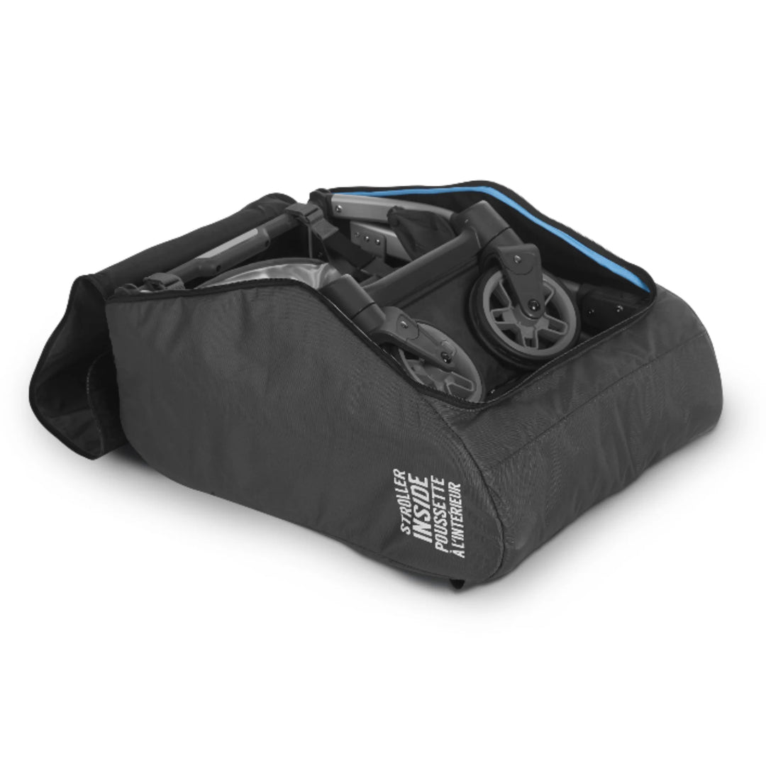 UPPAbaby Minu V2 stroller travel bag open with the stroller packed inside on a white background