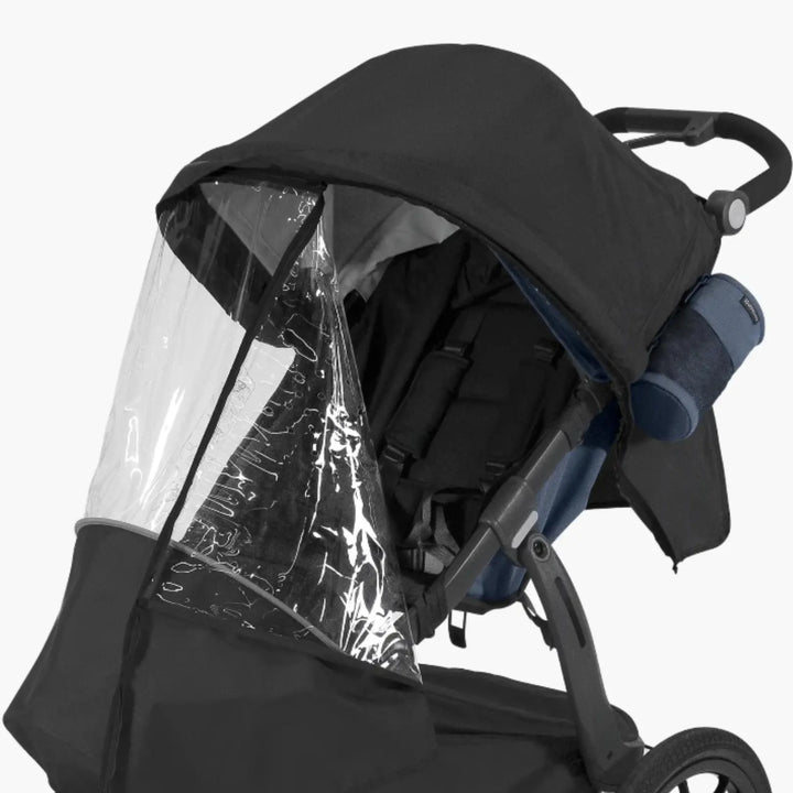 UPPAbaby RIDGE stroller with Performance Rain Shield fitted, clear waterproof cover and canopy providing full weather protection for baby while jogging or walking.