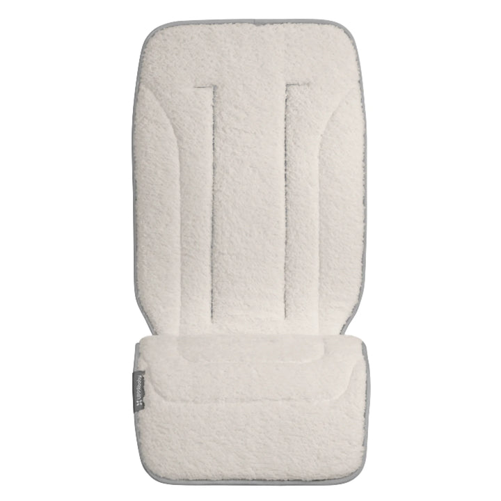UPPAbaby reversible stroller seat liner in Phoebe, soft cream insert on a white background