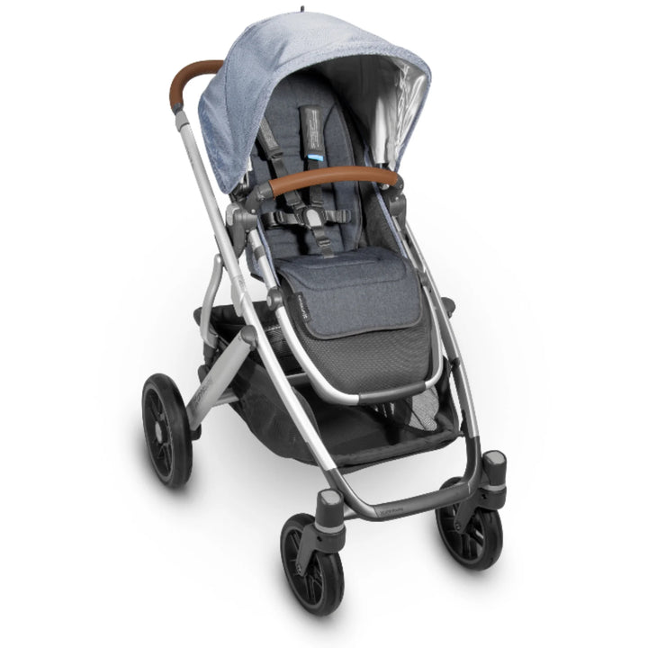 UPPAbaby reversible stroller seat liner in Reed installed in a stroller, dark grey seat insert on white background.