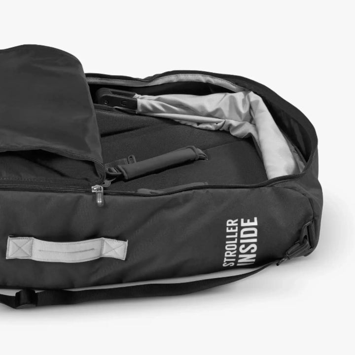 UPPAbaby travel bag for Carry Cot and RumbleSeat shown open with seat packed inside and ‘Stroller Inside’ label.