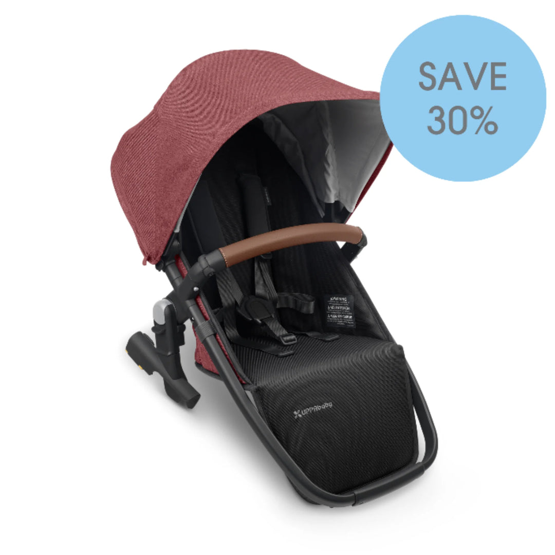 UPPAbaby Vista RumbleSeat V2 in red canopy with brown handlebar on a white background.