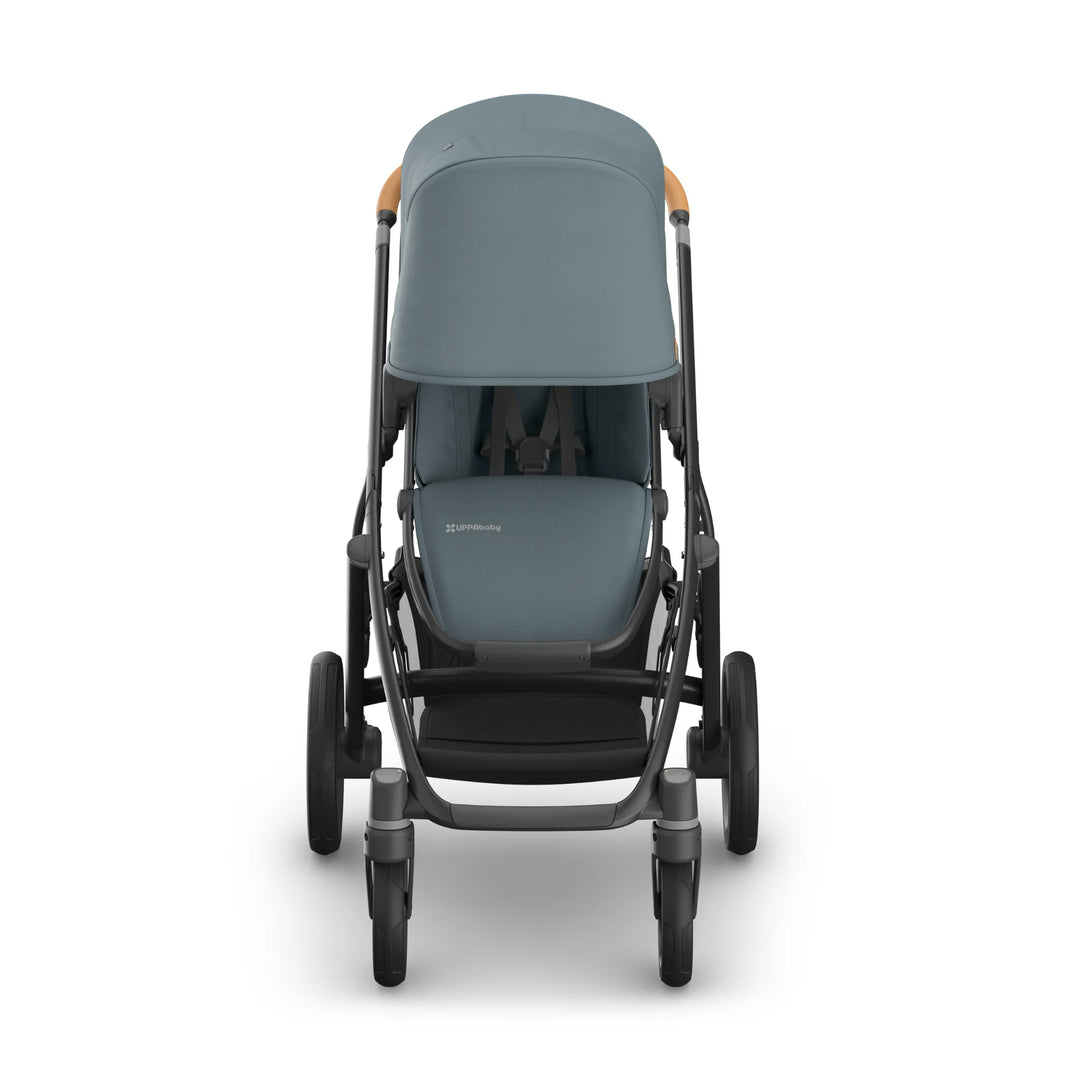 Front-facing view of the UPPAbaby Vista V3 stroller in the Dillian colourway, shown with extended canopy and premium leather details. High-end baby pushchair with durable all-terrain wheels, spacious seat, and sleek modern design on a clean white background.