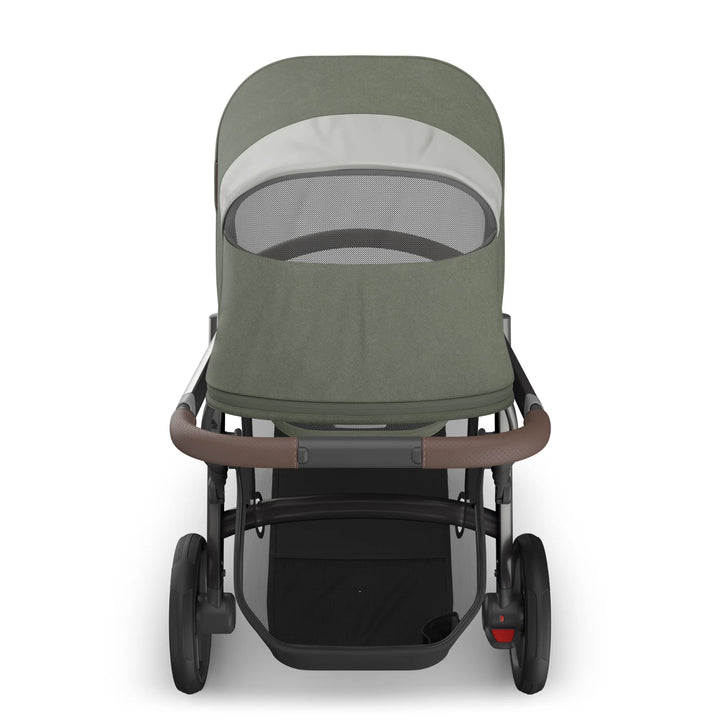 Rear view of the UPPAbaby Vista V3 carrycot in the Evelyn colourway, showing the breathable mesh ventilation panel, premium textured canopy fabric, leather-accented handlebar and large puncture-resistant wheels. Luxury newborn carrycot and pushchair system displayed on a clean white background.
