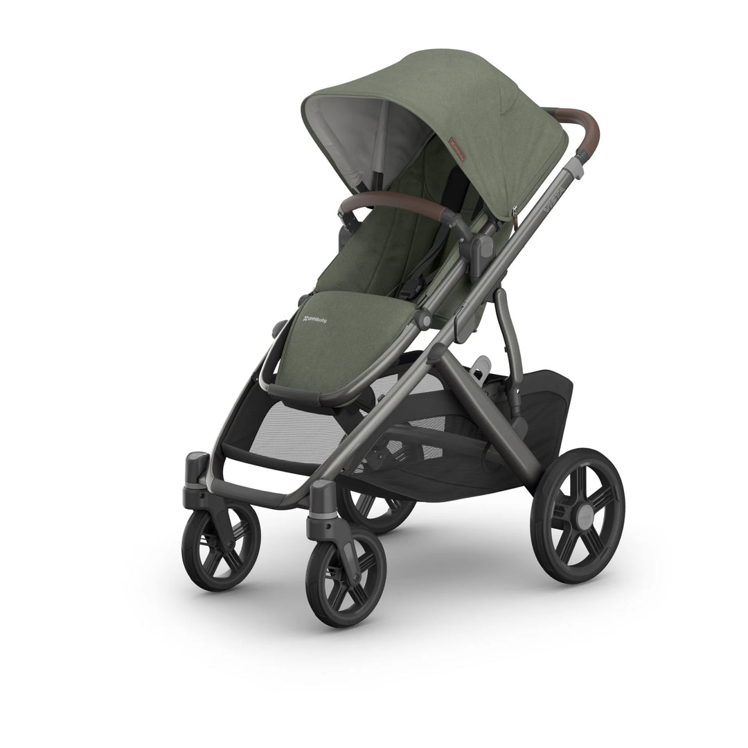“Front-angled view of the UPPAbaby Vista V3 stroller in the Evelyn colourway, featuring an extendable UPF sun canopy, premium full-grain leather handlebar, padded toddler seat and durable all-terrain wheels. Luxury modular pushchair design with extra-large storage basket, displayed on a clean white background