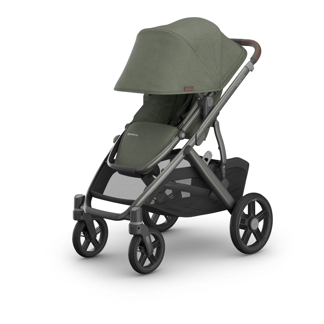 Front-angled view of the UPPAbaby Vista V3 stroller in the Evelyn colourway, shown with fully extended UPF sun canopy, premium leather handlebar, padded toddler seat and large all-terrain wheels. Luxury modular pushchair with extra-large under-seat storage basket, displayed on a clean white background.