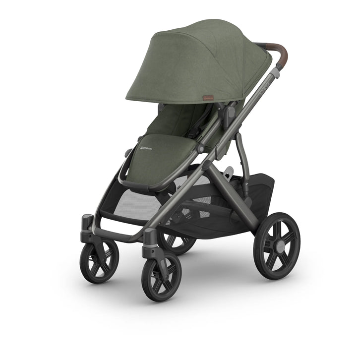 Front-angled view of the UPPAbaby Vista V3 stroller in the Evelyn colourway, shown with fully extended UPF sun canopy, premium leather handlebar, padded toddler seat and large all-terrain wheels. Luxury modular pushchair with extra-large under-seat storage basket, displayed on a clean white background.