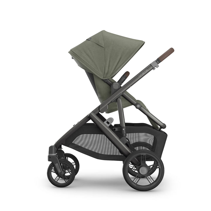Side view of the UPPAbaby Vista V3 stroller in the Evelyn colourway, featuring an extended UPF sun canopy, premium leather handlebar, spacious toddler seat and large all-terrain wheels. High-end modular pushchair design with oversized under-seat storage basket, displayed on a clean white background.