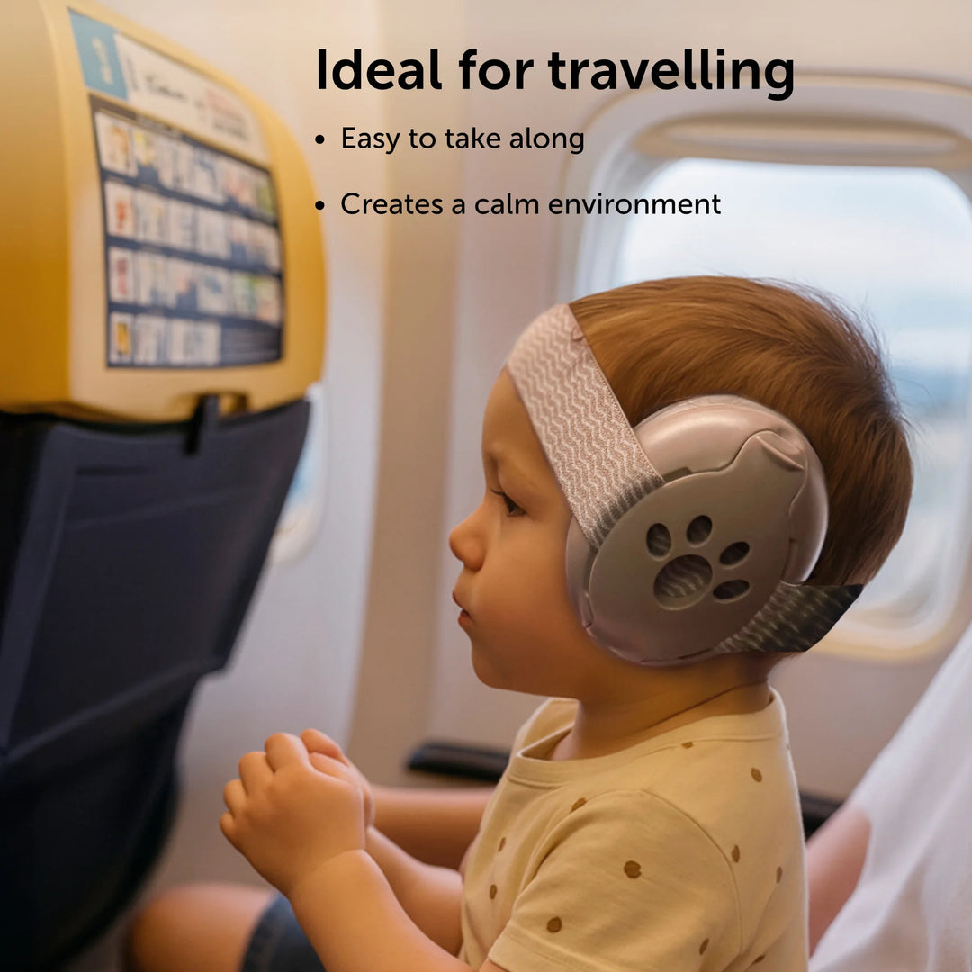 ZAZU baby and junior earmuffs hearing protection on an airplane, ideal for travelling and creating a calm environment with noise reduction during flights.