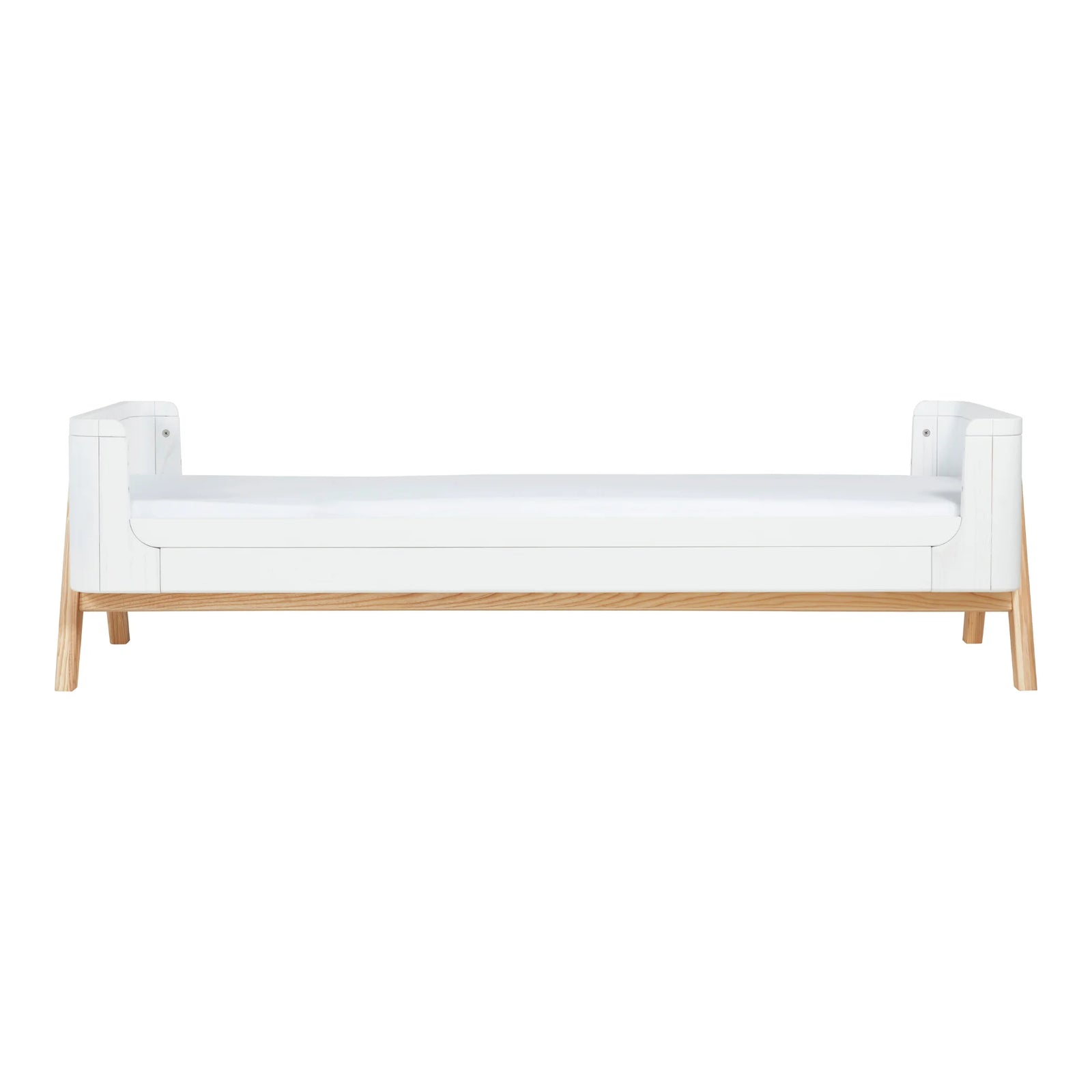 “aia Baby Hera junior bed extension in Scandi white with natural ash wood legs, shown fully extended as a low Montessori-style toddler bed for ages 4–5 years.