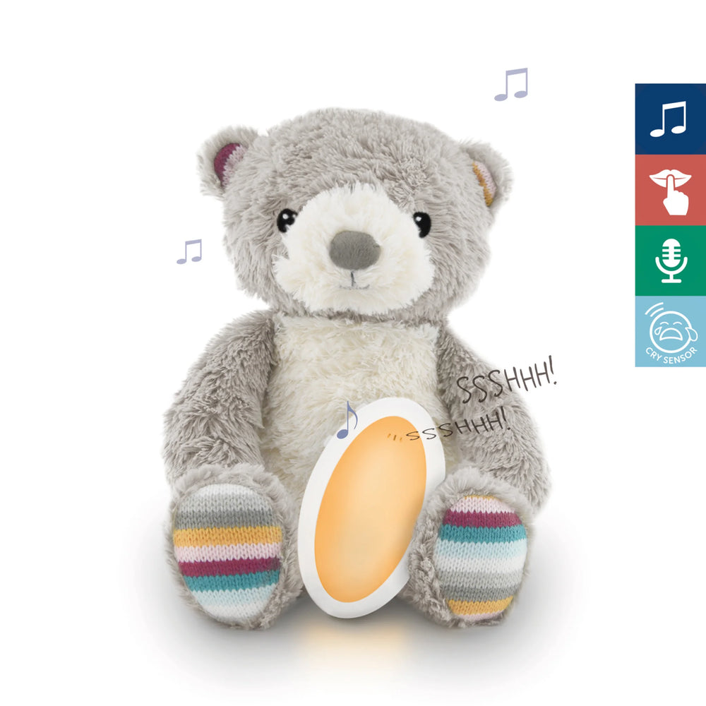 “Zazu Bruno Baby Soother – grey plush teddy bear night light that plays lullabies, white noise, and shushing sounds with voice and cry sensor technology to calm babies and help them sleep.”