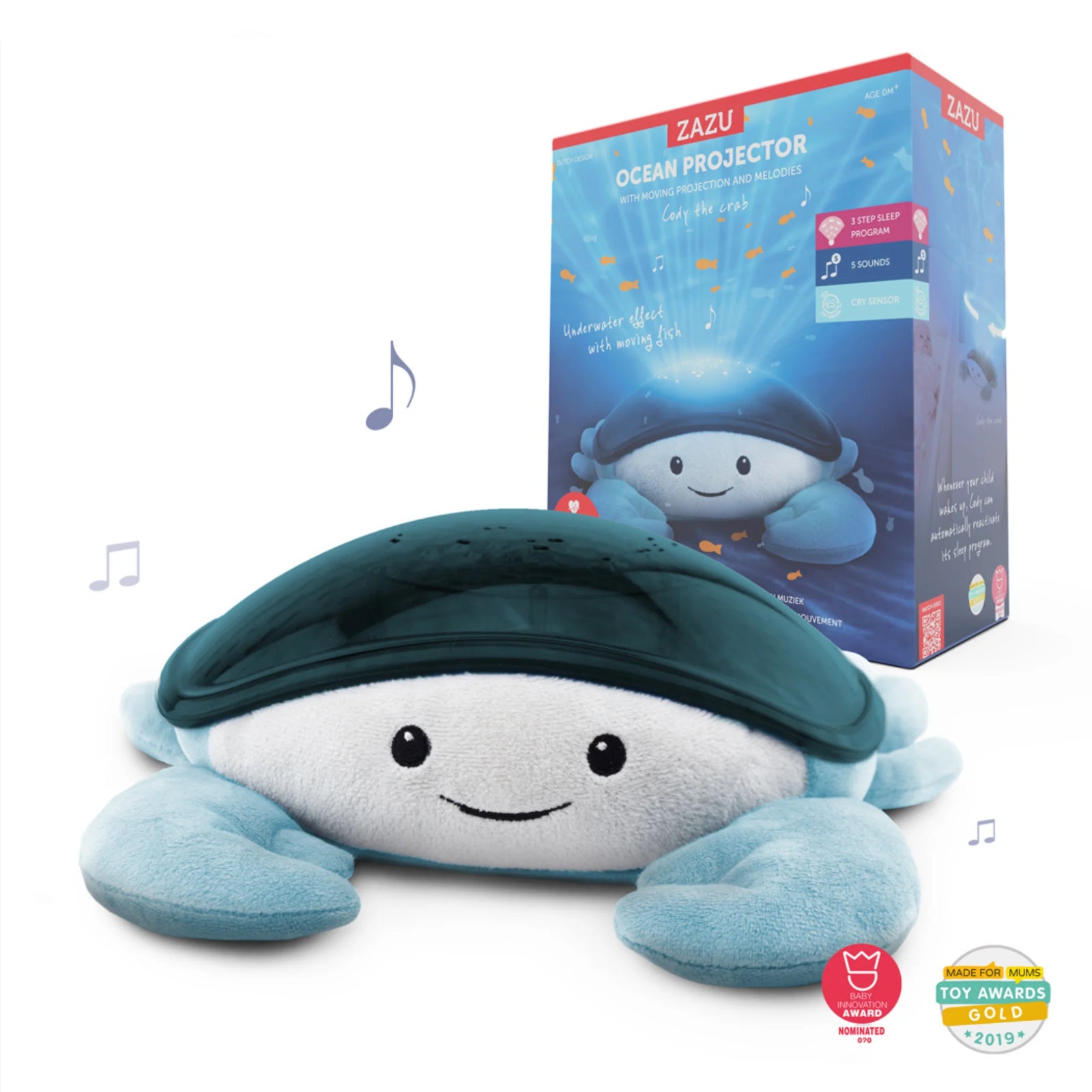 Zazu Cody Ocean Projector – plush blue crab nightlight with ocean wave projection and soothing melodies, shown with retail packaging and award badges for best baby sleep aid