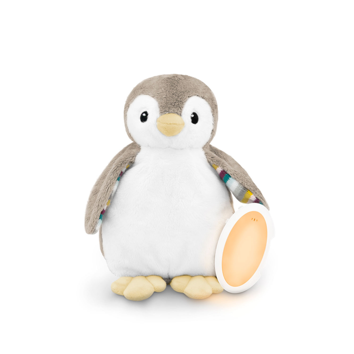 ZAZU Phoebe Penguin Baby Soother plush toy with soft grey and white fur, featuring a built-in night light and soothing sound module. Perfect sleep aid for babies with calming lullabies, white noise, and heartbeat sounds to promote relaxation and better sleep.