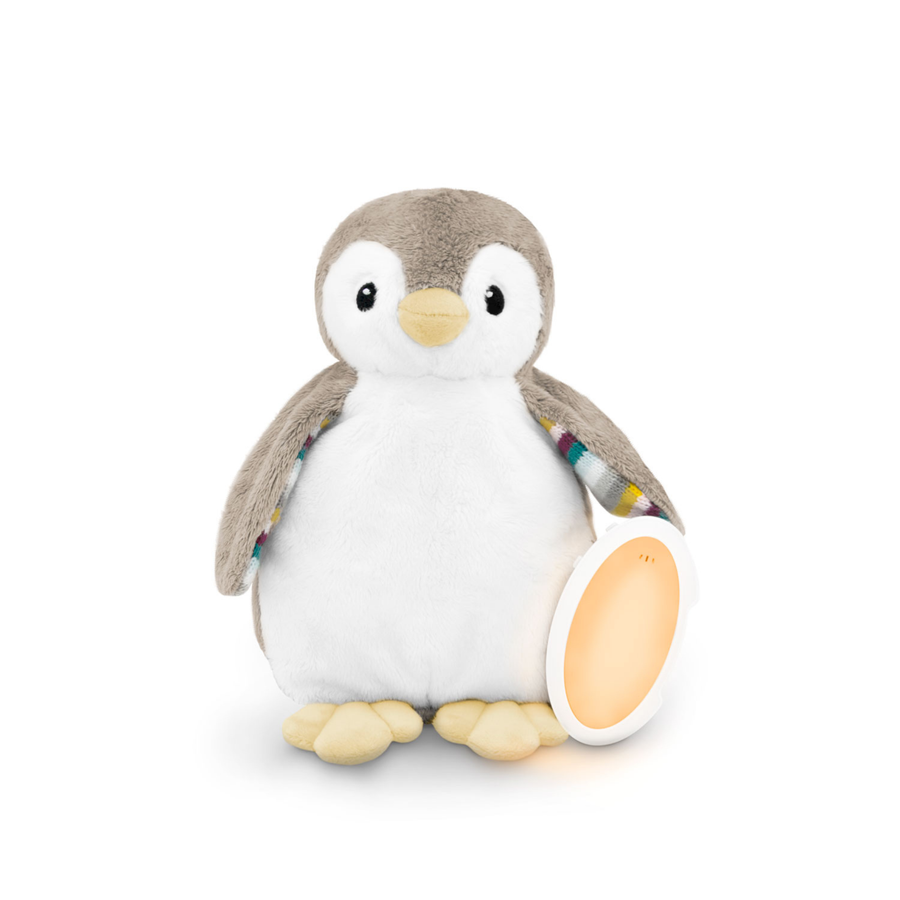 ZAZU Phoebe Penguin Baby Soother plush toy with soft grey and white fur, featuring a built-in night light and soothing sound module. Perfect sleep aid for babies with calming lullabies, white noise, and heartbeat sounds to promote relaxation and better sleep.