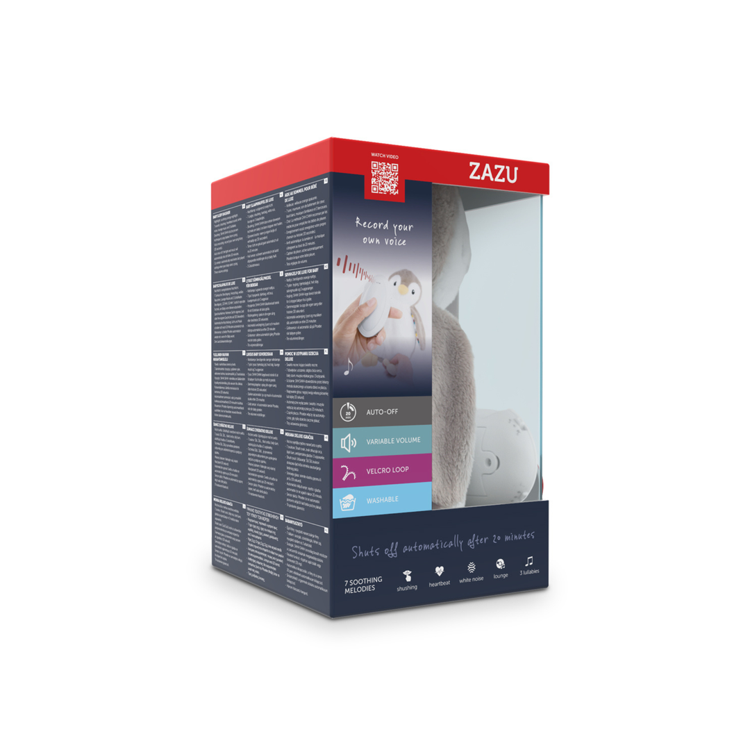 Packaging of ZAZU Phoebe Baby Soother featuring record-your-own-voice function, auto-off timer, adjustable volume, Velcro loop for attachment, and washable plush design. Box highlights seven soothing melodies including heartbeat, shushing, and white noise, ideal for helping babies sleep peacefully