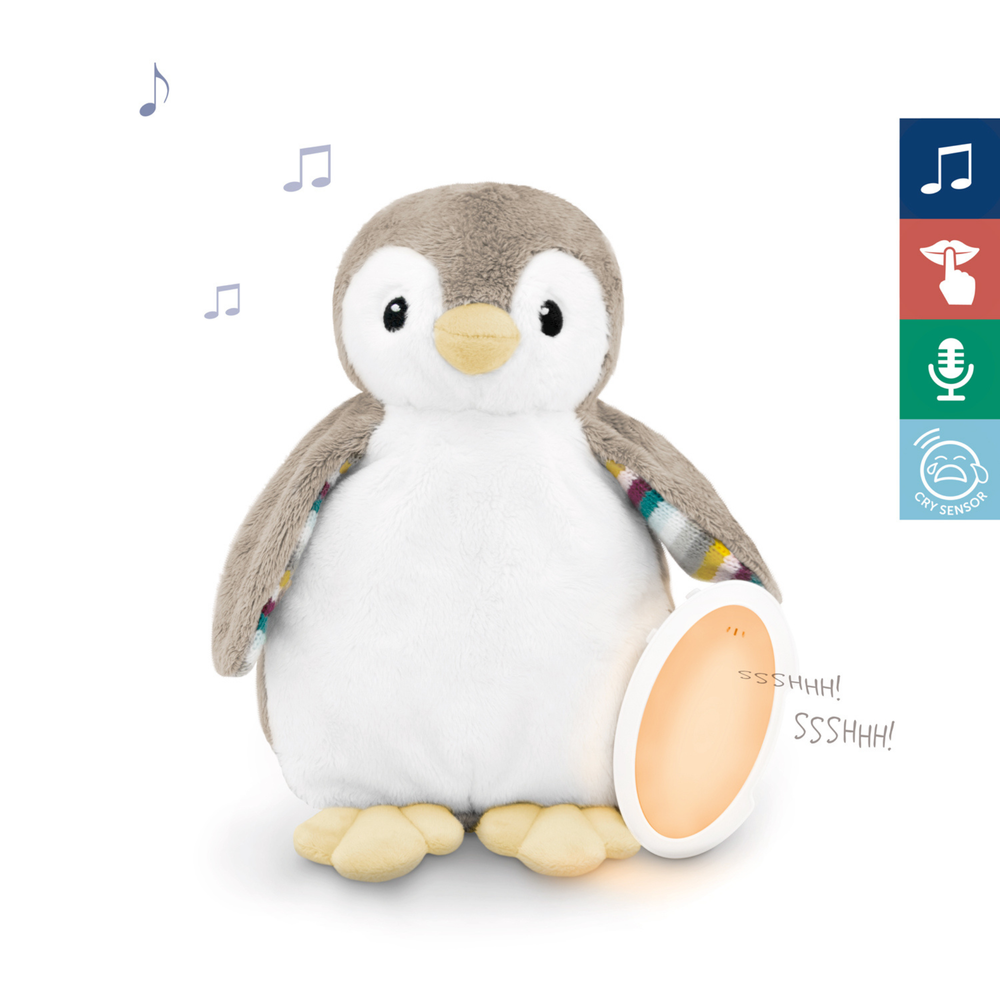 Soft penguin nightlight and baby soother toy, Zazu Phoebe Penguin, with glowing warm light and sound icons indicating lullabies, shushing sound, voice recording, and cry sensor — soothing sleep aid for babies and toddlers.